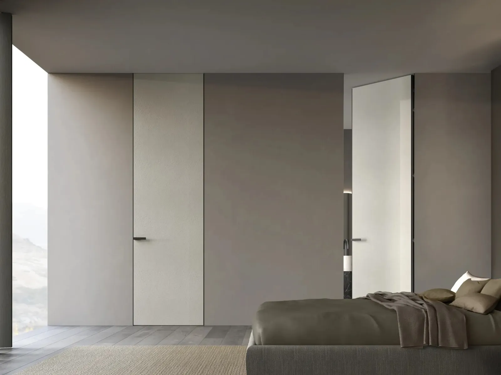 Puerta oculta Secret: la hoja queda enrasada con la pared, sin tapajuntas.