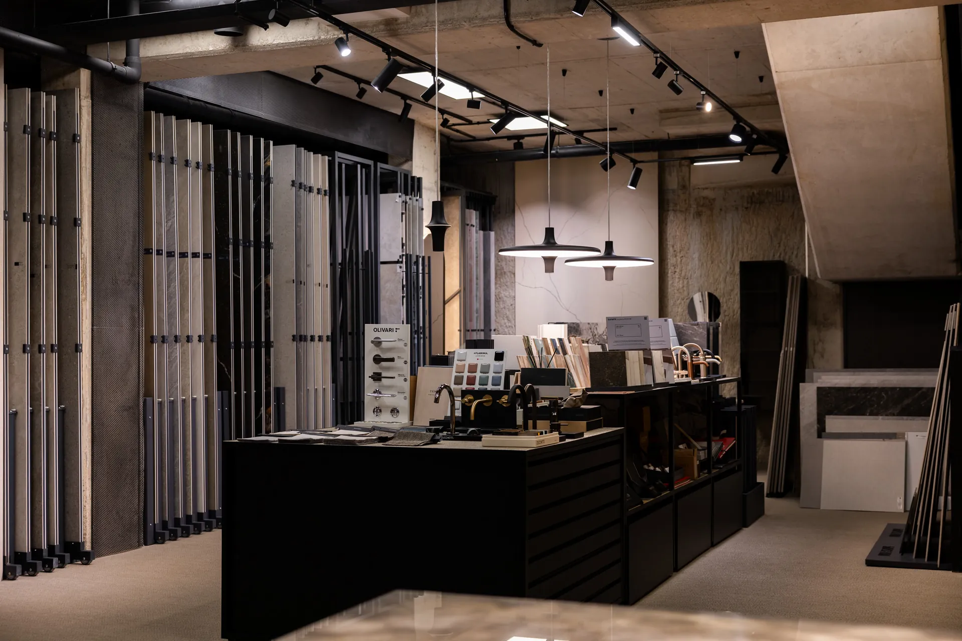The Betton showroom: sample racks and a table with fittings