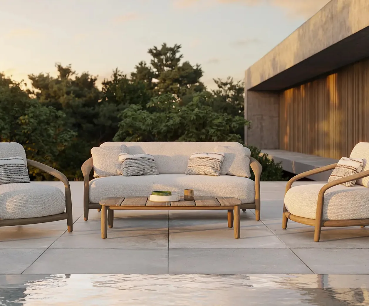 A terrace with teak furniture by the sea